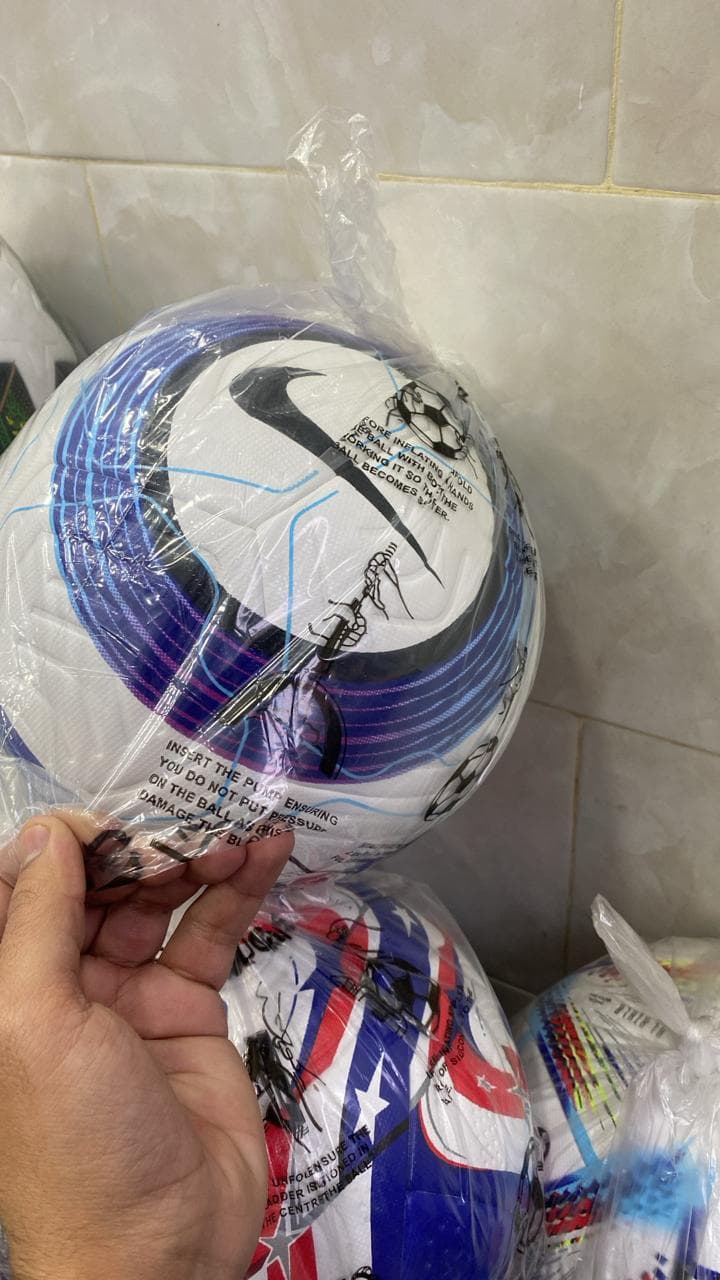 Elite training football packaged in polybag with inflation instructions